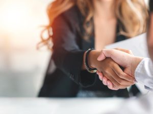 businesswoman-handshake-business-people-successful-business-concept